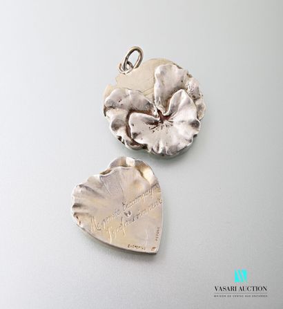 null Silver pendant in the shape of a pansy containing a heart engraved with the...