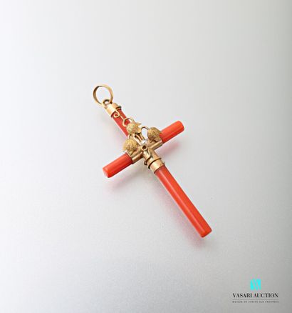 null Coral cross pendant, gold setting, decorated in the center with a leaf motif...