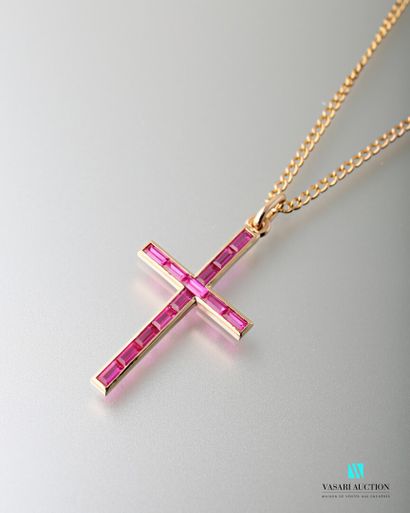 null A 750-thousandths yellow gold chain and a baguette-cut synthetic ruby pavé cross...