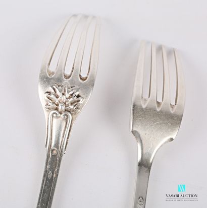 null Two silver forks, one with a number on the handle, the other with a number on...