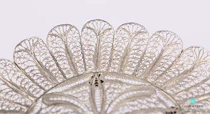 null A miniature silver filigree tray, oval in shape, standing on four feet, with...