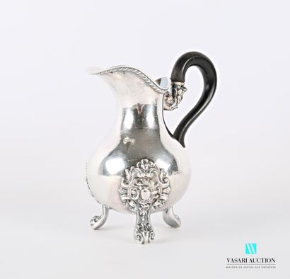 null Silver milk jug 950 thousandths of baluster form posing on three cambered feet...