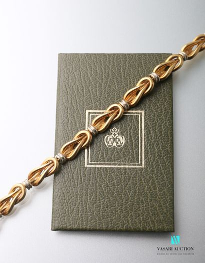 null Christofle, gold bracelet 750 thousandths of two tones, model knot of Héraclès...