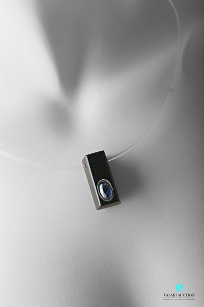 null Rectangular ebony pendant set with a 4.03 carats oval sapphire, sold with a...