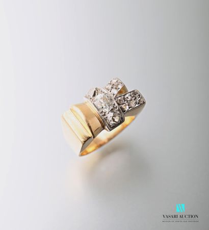 null Ring " Noeud " of the Fifties in yellow gold 750 thousandths and platinum decorated...