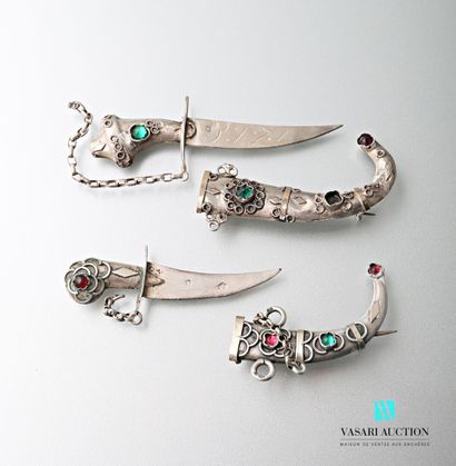 null Two silver brooches in the form of a dagger with a curved blade, the scabbard...