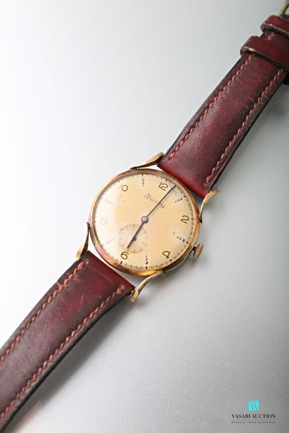 null Breitling, montre bracelet des années 1950, le boîtier rond en or jaune 750...