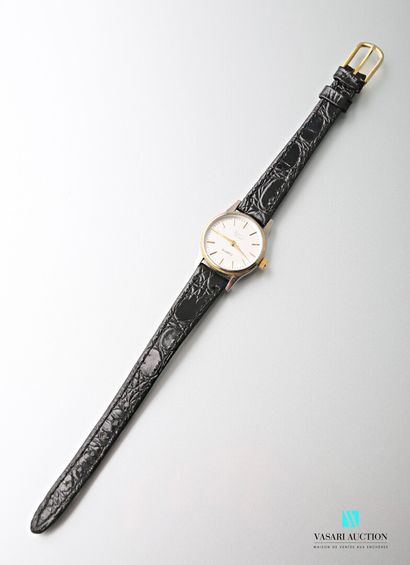 null Ladies' wristwatch in steel and gilt metal, the round silvered dial marked Georges...