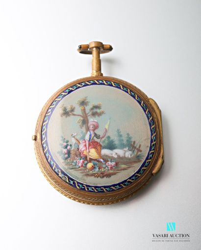 null A gilt metal pocket watch, the back decorated with a painted enamel depicting...