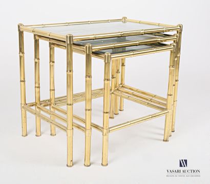 null Suite of three gilded metal nesting tables simulating bamboo, the glass tops,...