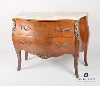 null Natural wood and veneer chest of drawers, the curved front decorated with a...