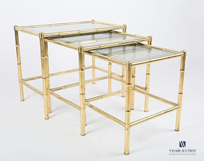 null Suite of three gilded metal nesting tables simulating bamboo, the glass tops,...