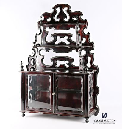 null Mahogany wall-mounted bookcase with a pyramidal shape and an openwork pediment....
