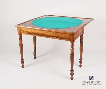 null Walnut and walnut veneer game table, the top opening up to reveal a round game...