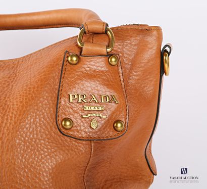 null PRADA. Tan leather bag with shoulder strap. Dustbag. Slight scratches. With...