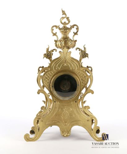 null Varnished bronze clock, the white enamelled dial of round shape, marked "G....