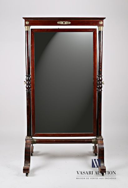 null A mahogany and mahogany veneer psyche mirror, standing on four inverted bracket...