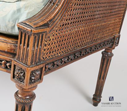 null Marquise in natural wood, moulded and carved and caned, the backrest centred...