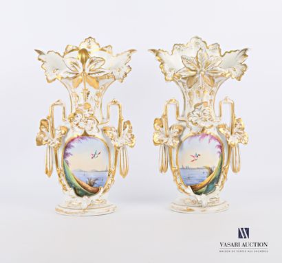 null A pair of white porcelain cone vases with gold highlights presenting a medallion...