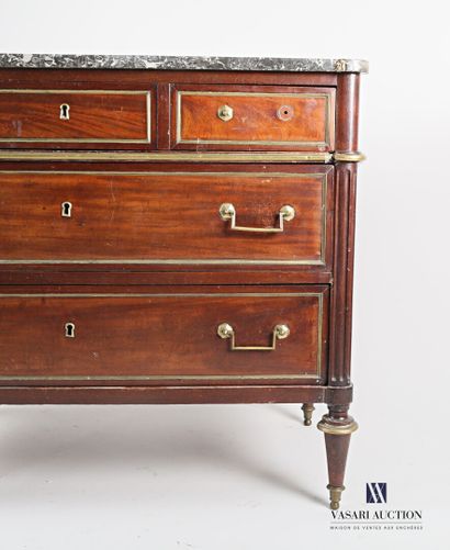 null A mahogany and mahogany veneer chest of drawers with inlaid leaves in brass...