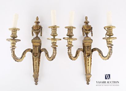 null A pair of ormolu sconces with two arms of light decorated with an acanthus leaf,...