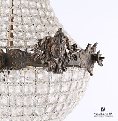 null A bronze balloon-shaped chandelier decorated with female mascaron alternating...