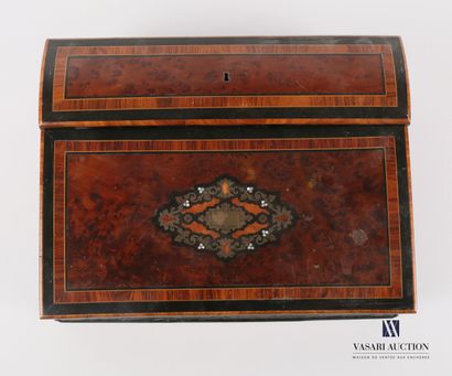 null Writing desk in burr veneer in framed fillets, the flap presents in its center...