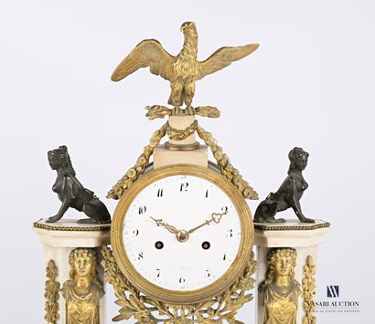 null Portico clock standing on a black marble base with a central projection decorated...