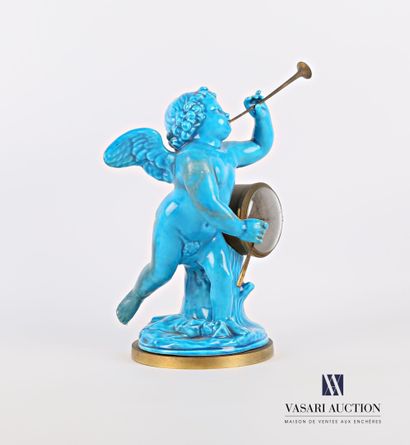 null Pendule en faïence turquoise et bronze représentant un angelot à la trompette,...