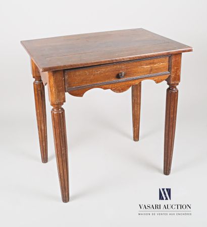 null Writing table in molded natural wood, the top is rectangular, it opens in the...
