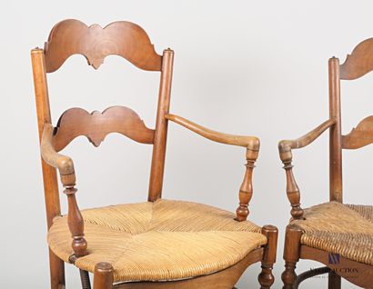null Pair of armchairs in natural wood, moulded and turned, the openwork back has...