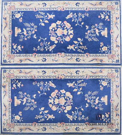 null CHINA 

Pair of mechanical woolen rugs decorated with urns, birds and flowers...
