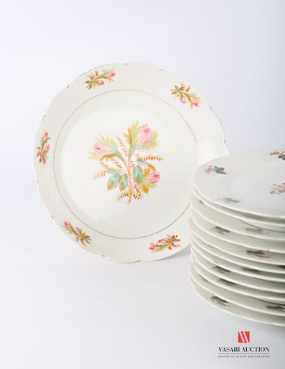 null A set of twelve white porcelain plates with a rim decorated with leaves and...