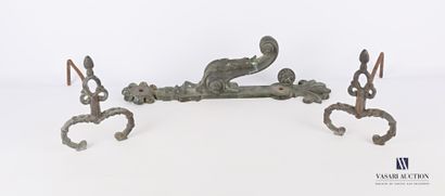 null Pair of metal andirons with scrolled legs decorated with foliage and topped...