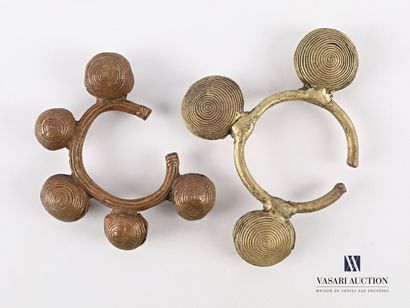 null AFRICA 

Set of two bronze and copper bells bracelets, the bells decorated with...