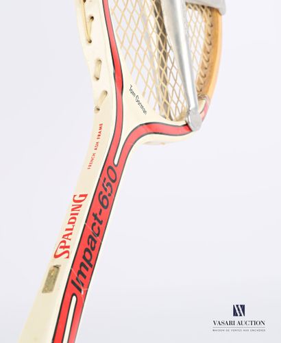 null Spalding wooden tennis racket, model Impact-650 Tom Gorman, with its metal guard...