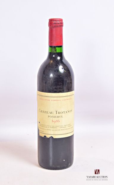 null 1 bouteille	Château TROTANOY	Pomerol	1986

	Et. fanée, tachée et déchirée. N...