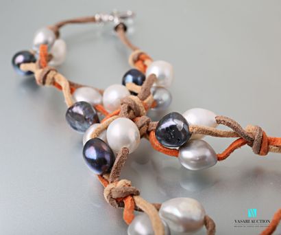 null Twisted leather necklace decorated with twenty four freshwater pearls of different...