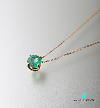null Chain and its pendant in yellow gold 750 thousandths of an emerald calibrating...