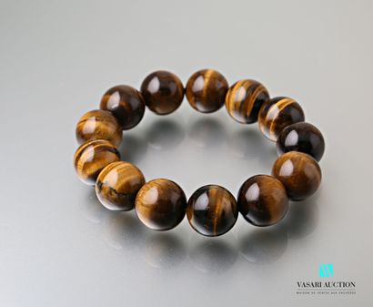 null Tiger eye beads bracelet 16,4 mm on elastic cord