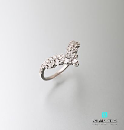 null White gold ring in the form of an openwork tiara set with round and baguette...