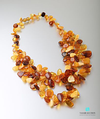 null Necklace drapery with three rows of amber lozenges, screw clasp.