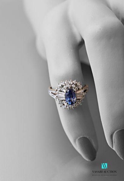 null Ring in platinum 900 thousandth set with a 0.95 carat oval sapphire set with...