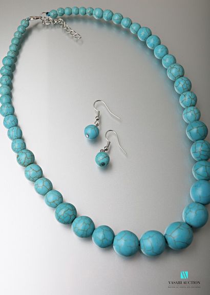 null Half set including a necklace and a pair of earrings decorated with turquoise...