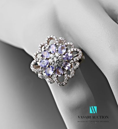 null Ring in silver 925 thousandths floral motive set with tanzanites and white stones...