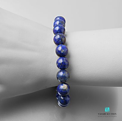 null Bracelet orné de billes de lapis lazuli sur élastique

Diam. : 7 cm