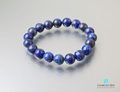 null Bracelet decorated with lapis lazuli beads on elastic

Diameter : 7 cm