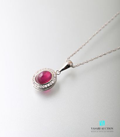null A silver chain 925 thousandths twisted mesh and an oval pendant set with a ruby...