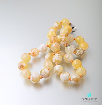 null Necklace with faceted yellow agate beads, the clasp in steel snap hook.

Length...