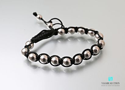 null Bracelet on black cotton cord decorated with steel beads.